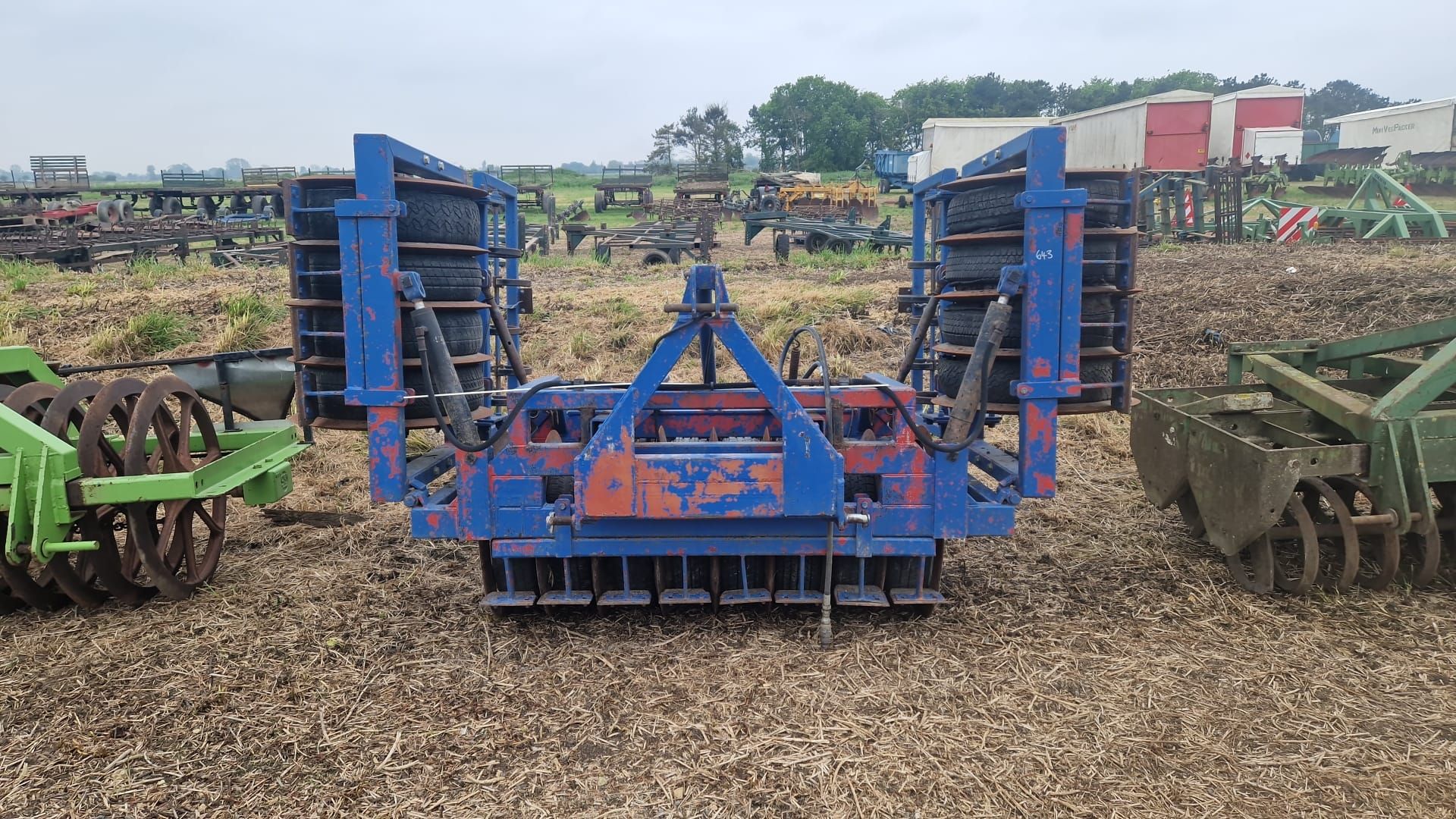 Front mounted 4m press with leading tines, hydraulic folding & work lights