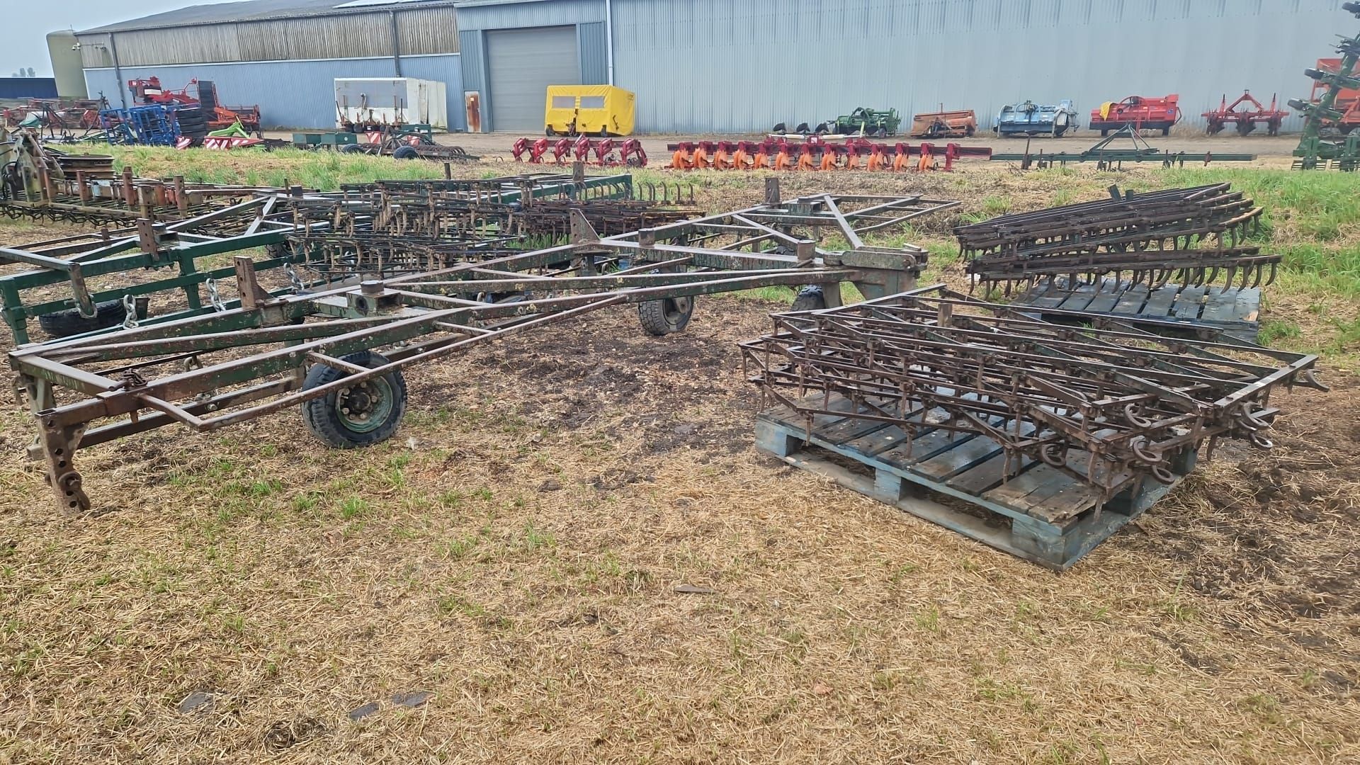 Trailed 6m harrow gantry on caster wheels with 3 sets of various weighted harrows - Image 2 of 2