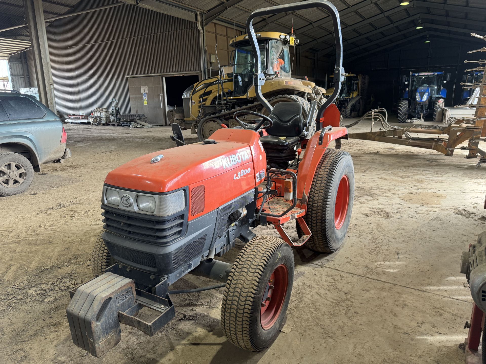 (07) Kubota L3200 4WD compact tractor 4 front weights, grass tyres, ROPS bar, Front tyres: 212/80D15 - Image 2 of 4