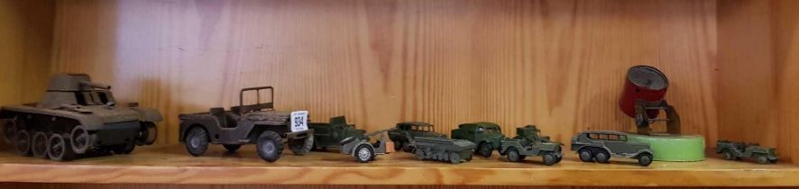 SHELF OF MILITARY VEHICLES MAINLY MADE BY DINKY,