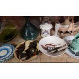 SHELF WITH MISC DECORATIVE GLASS & PLATES & A GLASS SHIP'S DECANTER STYLE BOTTLE MARKED CE