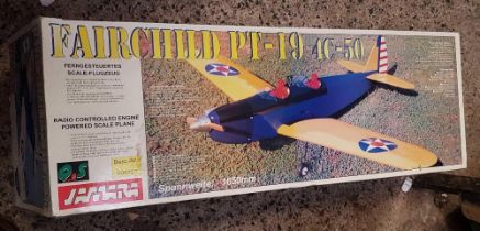 A FAIR CHILD PT-19 4C - 50 RADIO CONTROLLED AIRCRAFT KIT IN BOX,