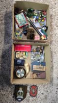 2 CARTONS OF MISC BRIC-A-BRAC INCL; A SMALL BAROMETER, MONEY BOX, METAL PUZZLES ETC