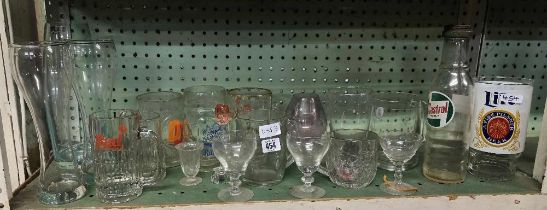 SHELF OF GLASSES & GLASSWARE WITH ADVERTISING SLOGANS