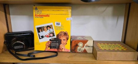 KODAMATIC 950 INSTANT CAMERA, A VIEWING BOX FOR TRANSPARENCIES, A VIEW MASTER & A YASHICA ELECTRO 35