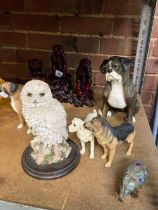 SHELF OF ANIMAL ORNAMENTS