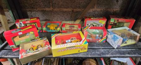 SHELF OF 10 BOXED BRITAIN'S FARM TRACTORS,