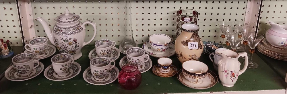 SHELF OF CHINAWARE CUPS & SAUCERS & GLASSWARE