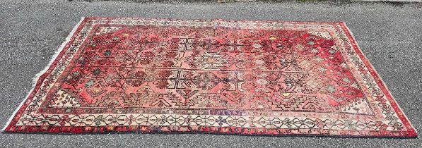 100" X 56" RED PATTERNED RUG