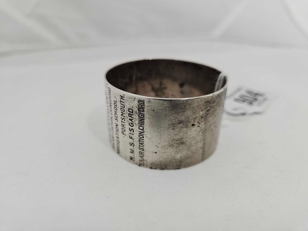 A ROYAL NAVY SILVER NAPKIN RING ENGRAVED WITH FOLLOWING CAREER OF R. - Image 2 of 2