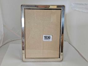 A GOOD OBLONG SILVER MOUNTED PHOTO FRAME EASEL BACK,