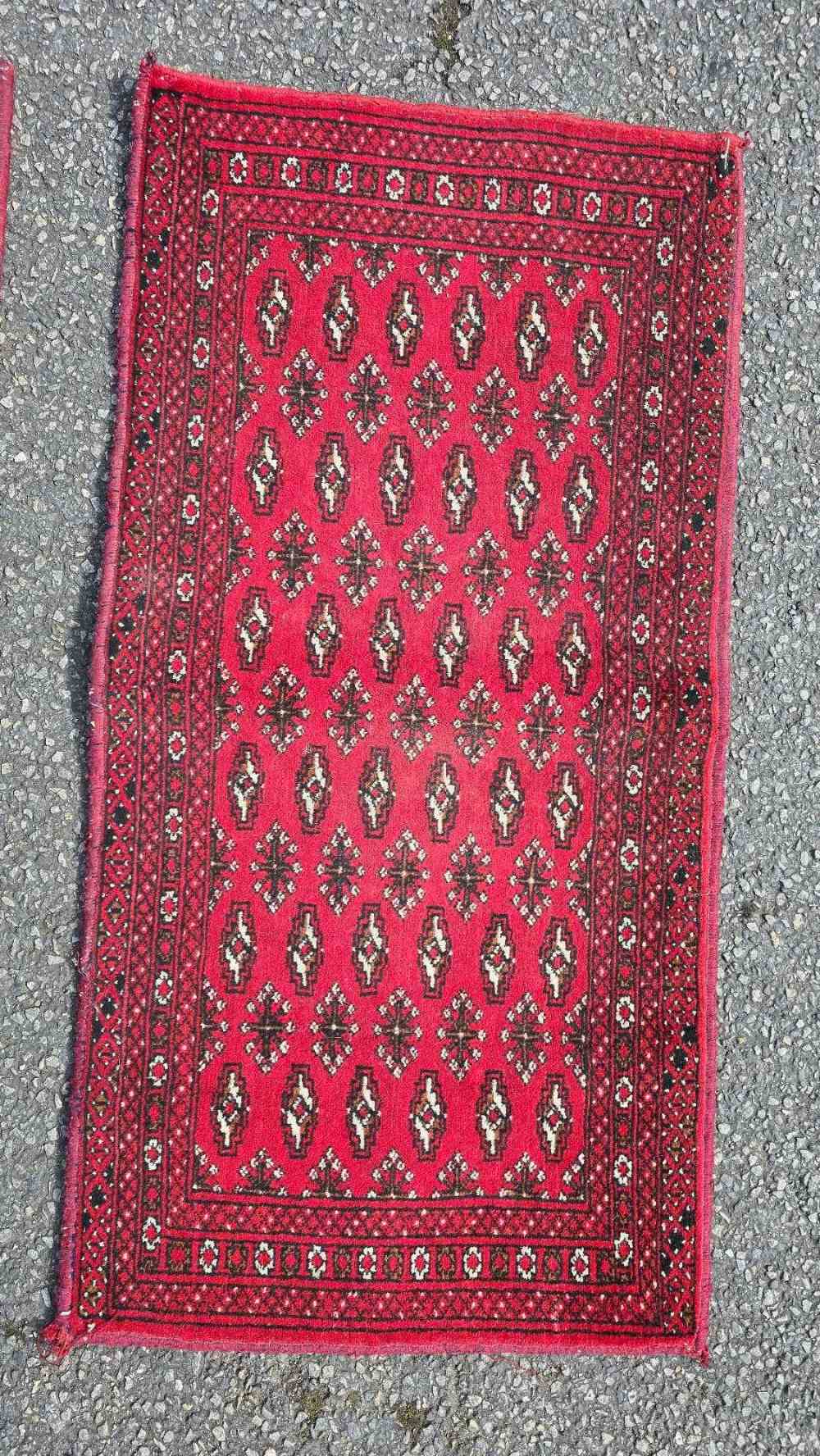PAIR OF RED RUGS 45" X 22" - Image 2 of 2