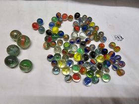 TUB OF MISC GLASS MARBLES