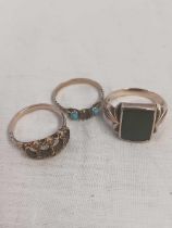 3 SCRAP GOLD RINGS, 1 WITH BLACK STONE, TOTAL W. 10.