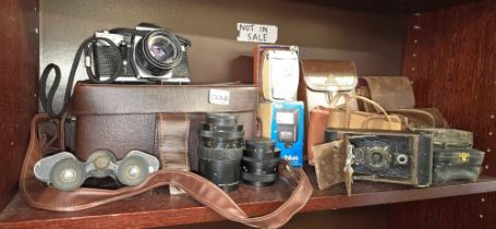 SHELF WITH MISC EMPTY CAMERA CASES & ACCESSORIES,