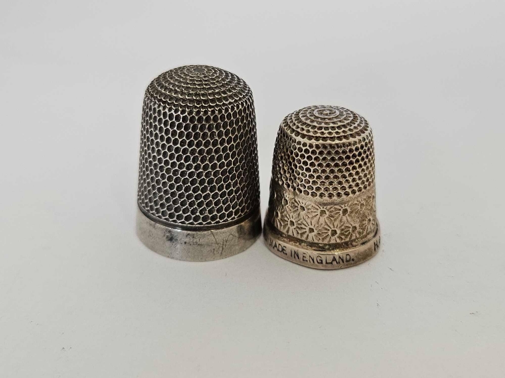 TWO SILVER THIMBLES,