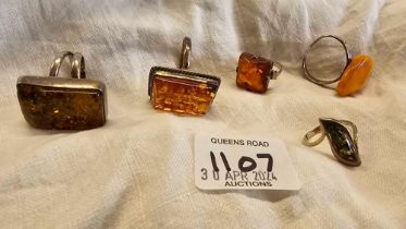 5 SILVER & AMBER RINGS