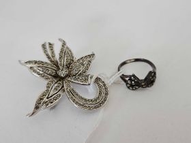 A SILVER & MARCASITE FLOWER HEAD BROOCH & A SIMILAR RING