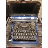 PORTABLE TYPEWRITER BY BAR-LET IN METAL CARRY CASE