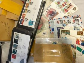 BOX CONTAINING PKTS OF USED & MINT WORLD STAMPS & 1 ALBUM OF FDC'S