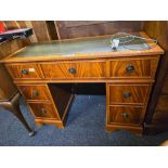 DYNATRON MUSIC CENTRE WITH SPEAKERS IN THE FORM OF A YEW WOOD KNEEHOLE DESK WITH LEATHER TOP