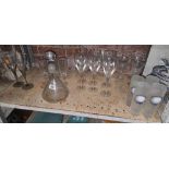 SHELF OF MISC DRINKING GLASSES & A DECANTER