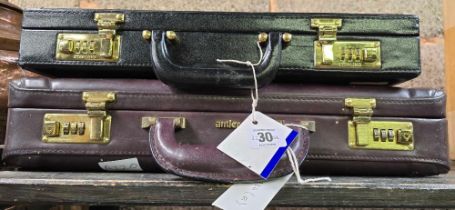 2 LEATHER TYPE BRIEF CASES,