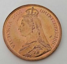 A VICTORIAN MODEL COIN DATED 1887