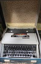 OLIVETTI DORA PORTABLE TYPEWRITER IN CASE,