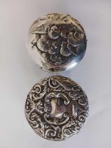 TWO SILVER TOP JARS, ONE WITH ANGEL HEADS,
