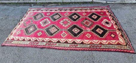 115" X 60" RED PATTERNED CARPET