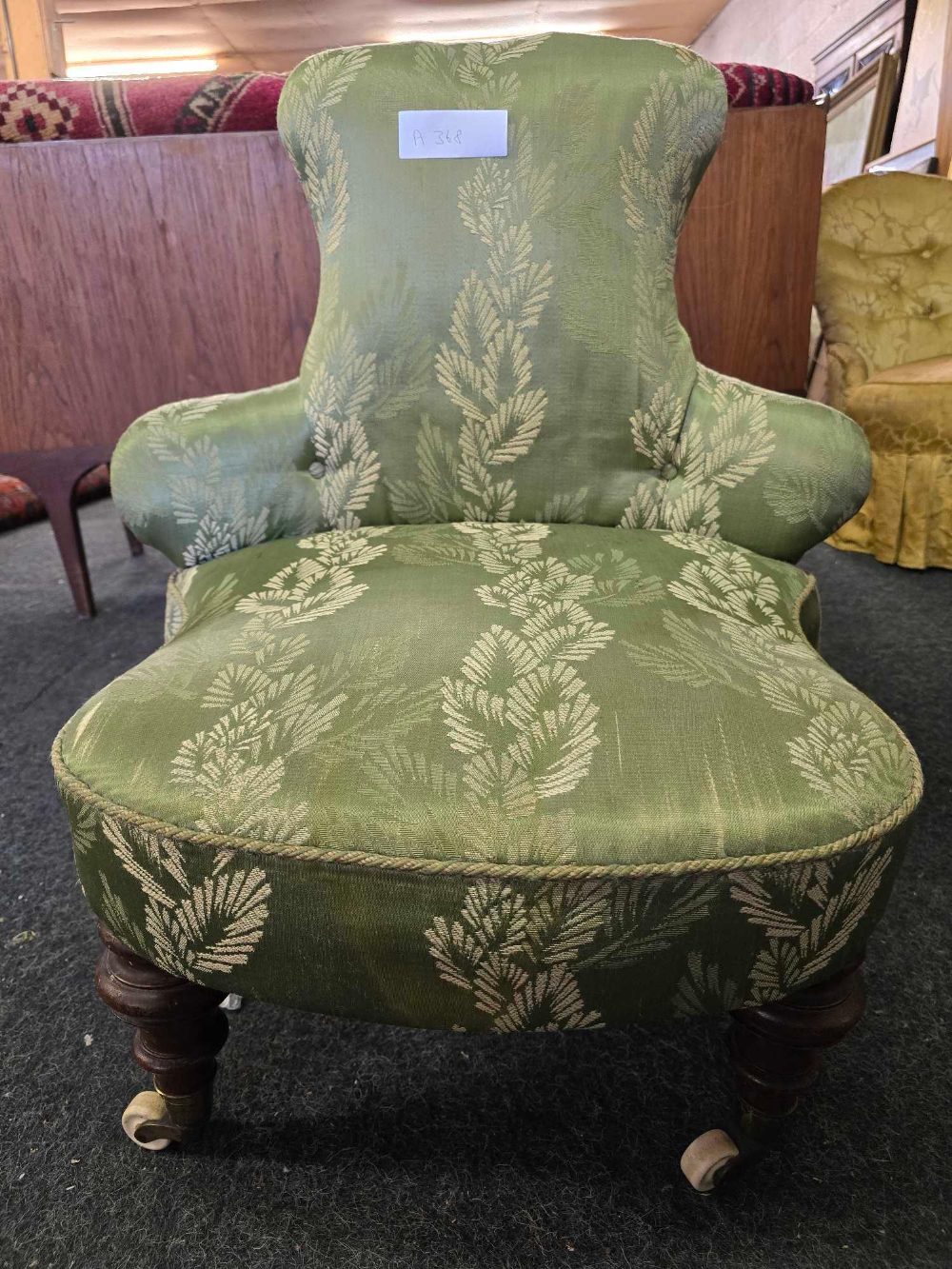 GREEN PATTERNED ANTIQUE CHAIR