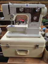 CASED NEWHOME SEWING MACHINE,