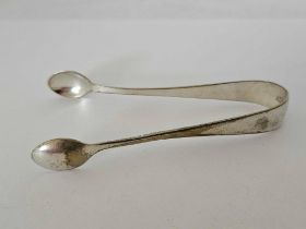 PAIR OF WHITE METAL SUGAR TONGS