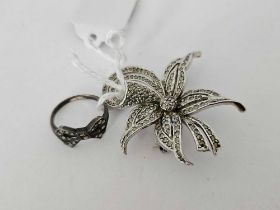 A SILVER & MARCASITE FLOWER HEAD BROOCH & A SIMILAR RING