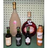 4 MINIATURE BOTTLES OF ALCOHOL,