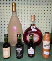 4 MINIATURE BOTTLES OF ALCOHOL,