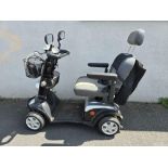 GREY & BLACK 4 WHEELED UNIDENTIFIED MOBILITY SCOOTER