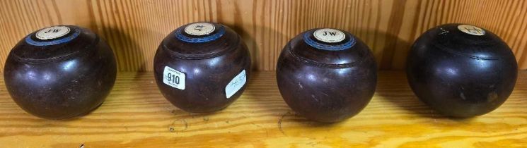 4 WOODEN LAWN BOWLS