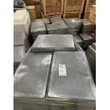 SKID OF PERFORATED METAL FOOD TRAYS