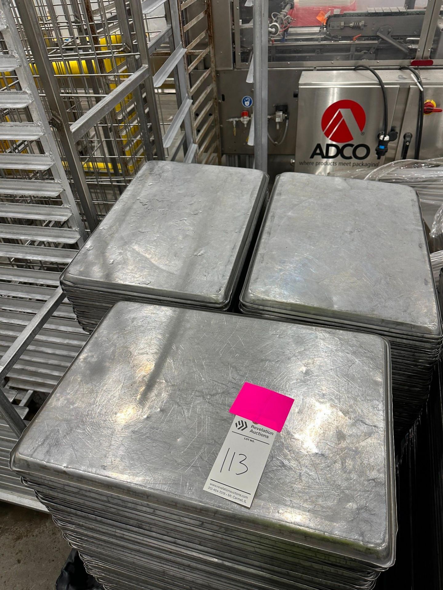 SKID OF METAL FOOD TRAYS