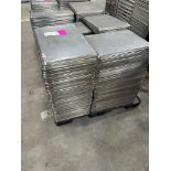 SKID OF PERFORATED METAL FOOD TRAYS