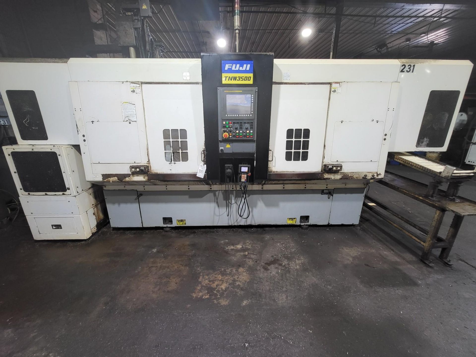 2007 FUJI TNW-35TR 6-AXIS TWIN SPINDLE LIVE TOOL LATHE W/ GANTRY ROBOT