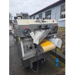 TRIO SKINNING MACHINE