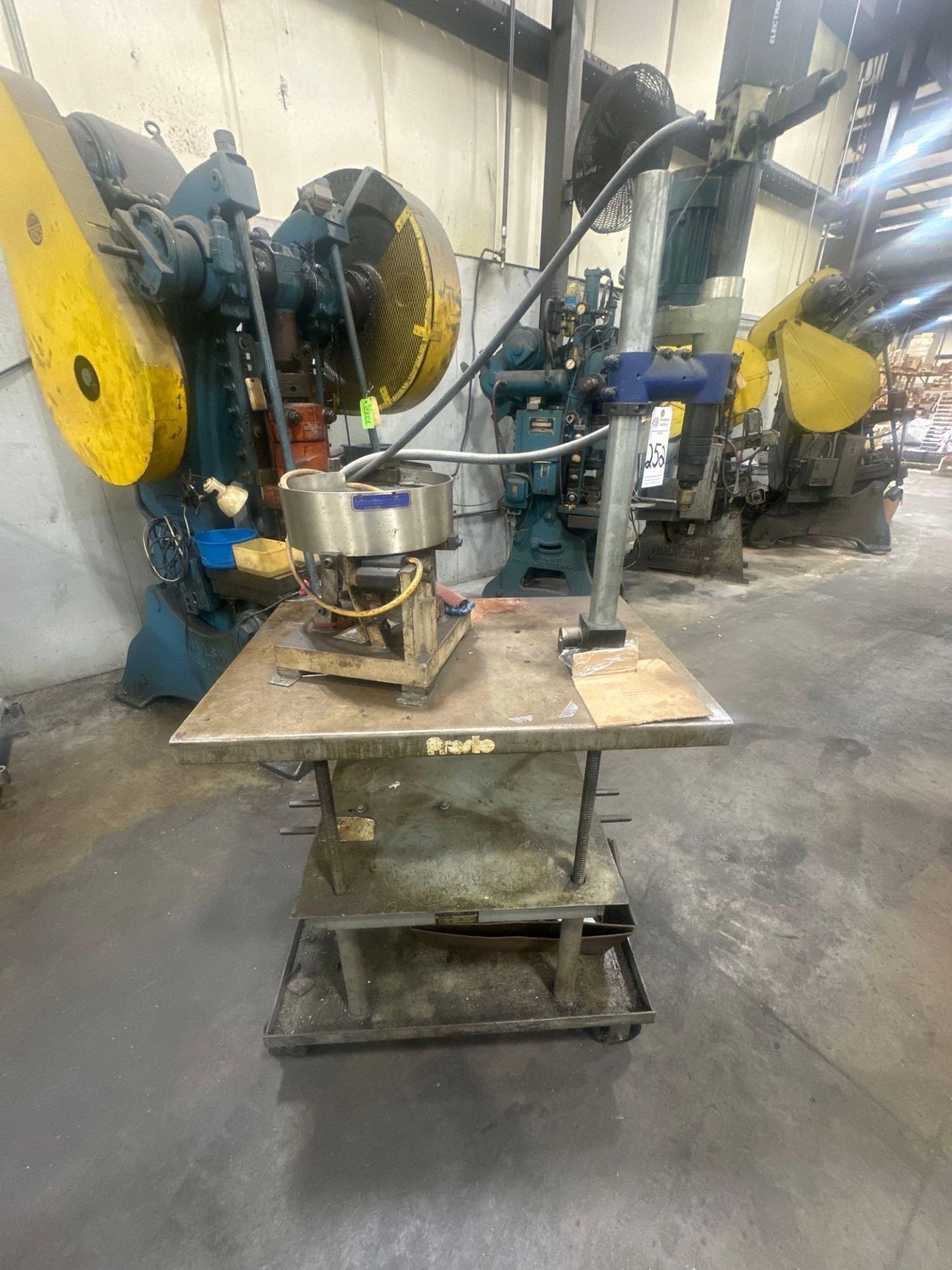 DRILL PRESS AND FEEDER ON ROLLING TABLE