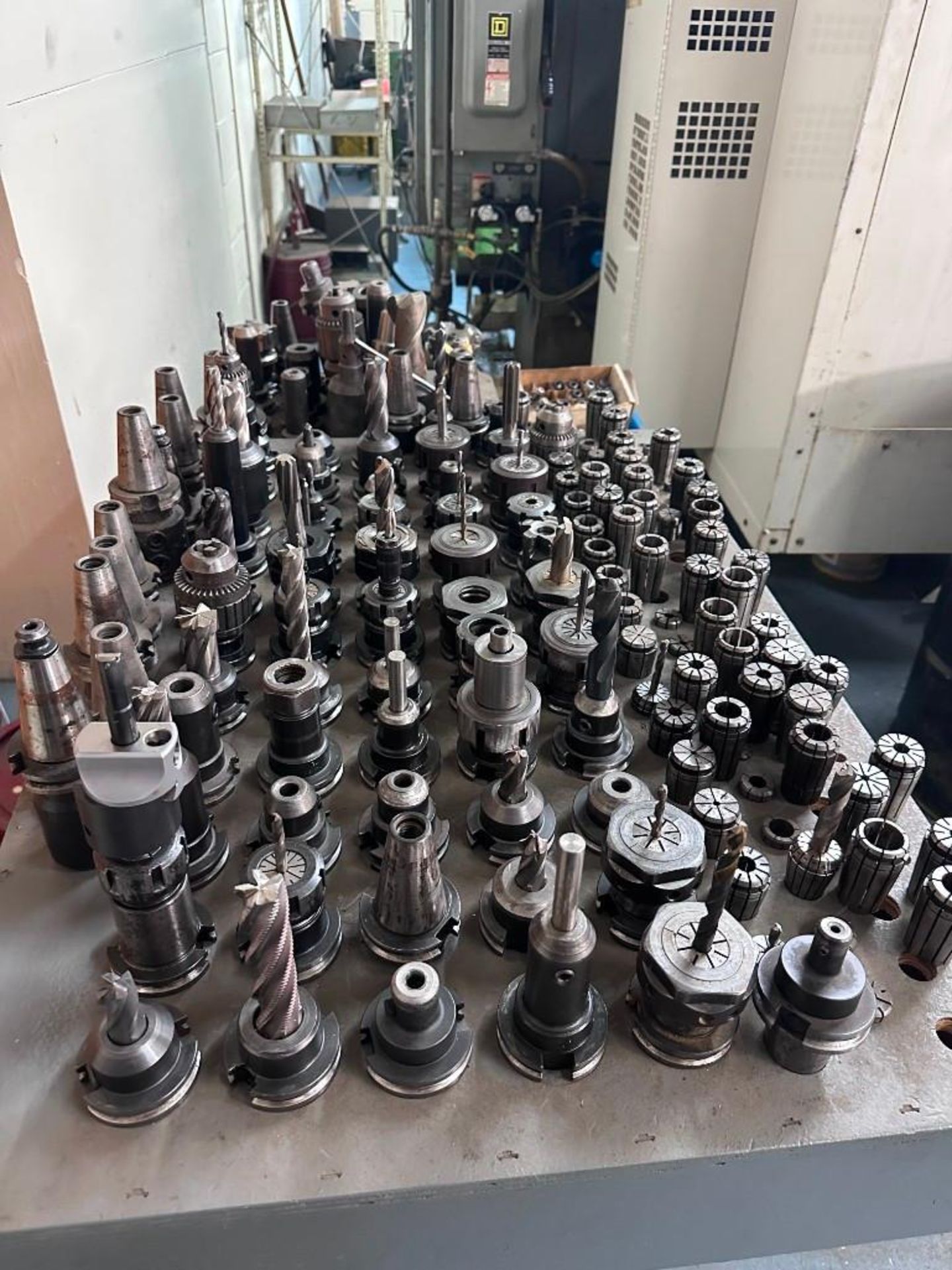 LOT OF CAT 40 TOOL HOLDERS AND TOOLING WITH COLLET SETS Item Location ...