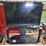 Hitachi L42VC04U H 42 inch LCD TV - NO REMOTE with Black TV stand with glass top and middle shelves
