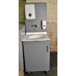 Portable hand wash station with under counter storage, paper towel dispenser