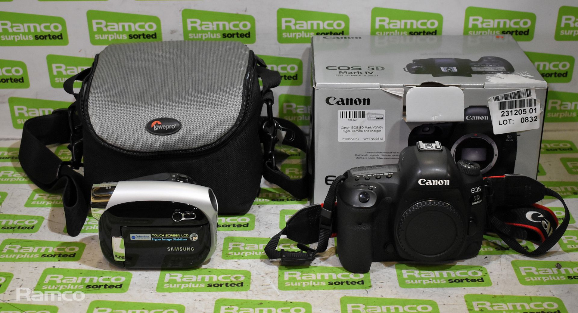Canon EOS SD Mark IV(WG) digital camera and charger, Samsung VP-DX10 / XEU camcorder