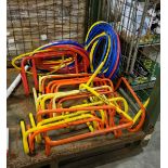 20x Plastic hurdles and approximately 50 multi coloured plastic rings